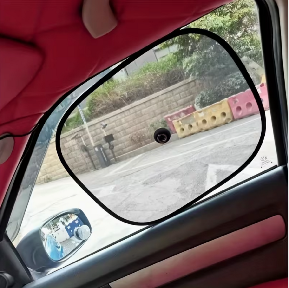 Mesh car window sun shade mounted with suction cup